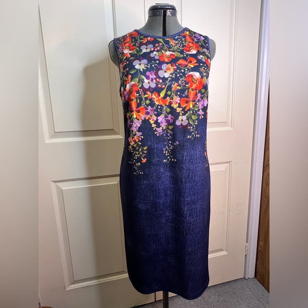 Blue dress with floral pattern. Designed by stylist June Ambrose.